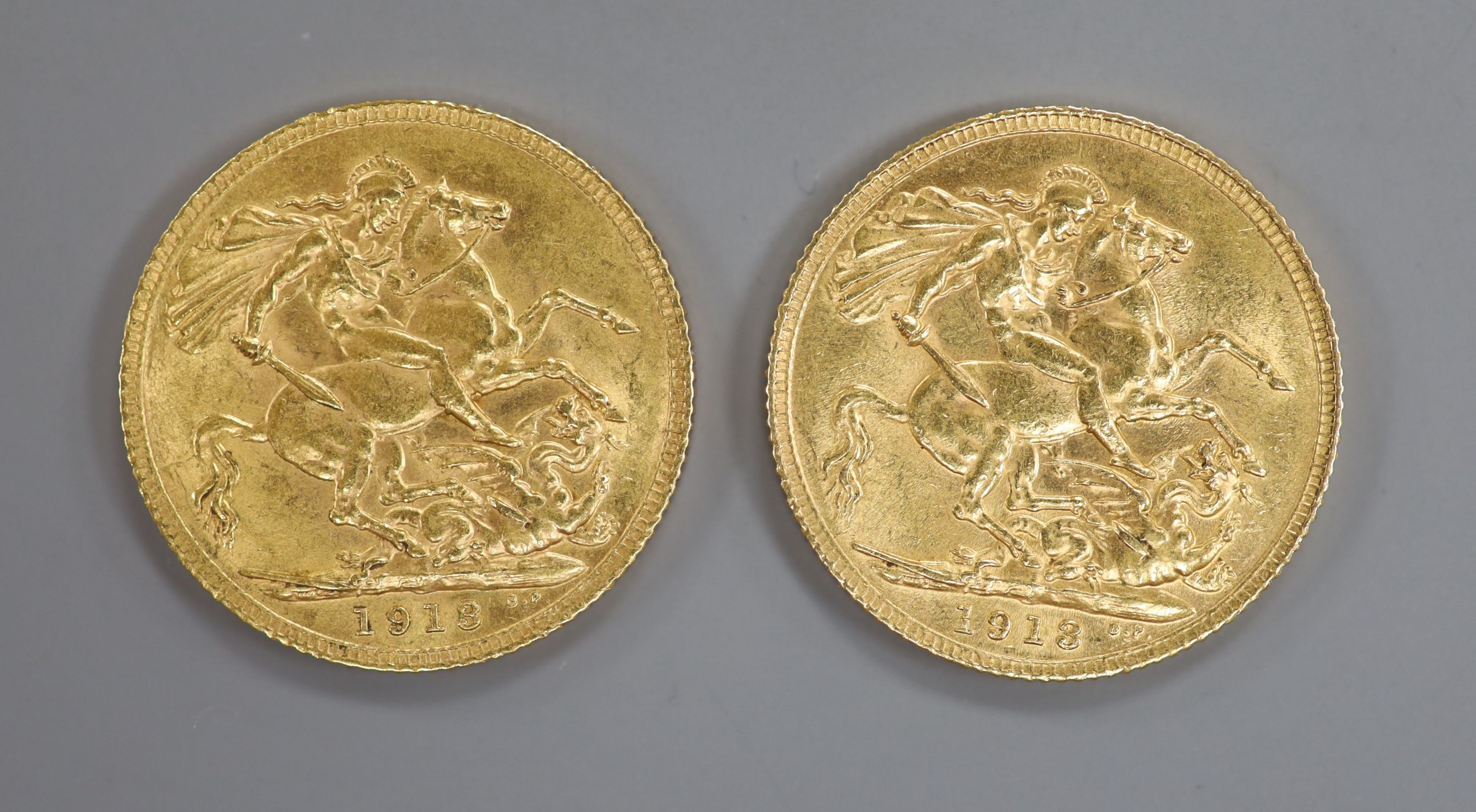 Two George V 1913 gold sovereigns.